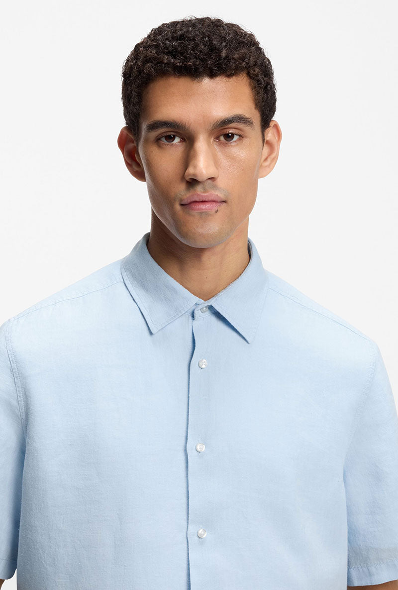 Front image of a model wearing Rash 2 ss shirt in light blue, by brand Boss