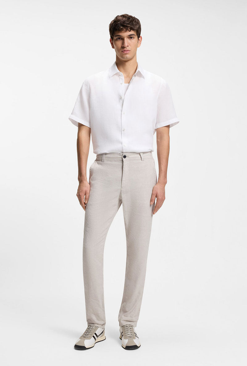Front image of a model wearing Rash 2 ss shirt in white, by brand Boss