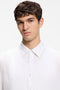 Front image of a model wearing the Rash 2 ss shirt in white, by brand Boss
