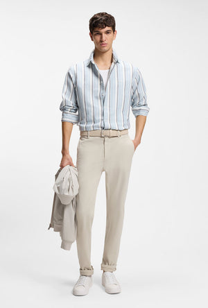 Front image of a model wearing the Rhys trainers in white, by brand Boss