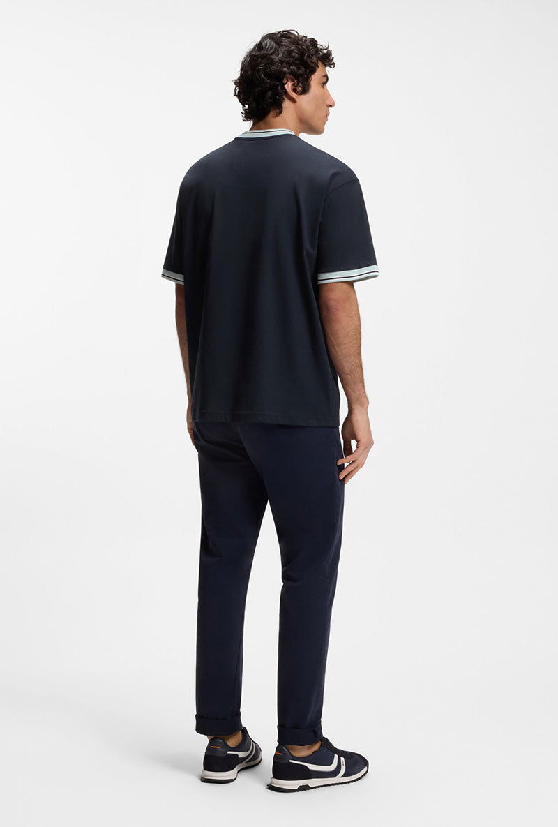 Back image of a model wearing Te blocks tshirt in navy, by brand Boss