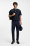 Front image of a model wearing the Te blocks tshirt in navy, by brand Boss