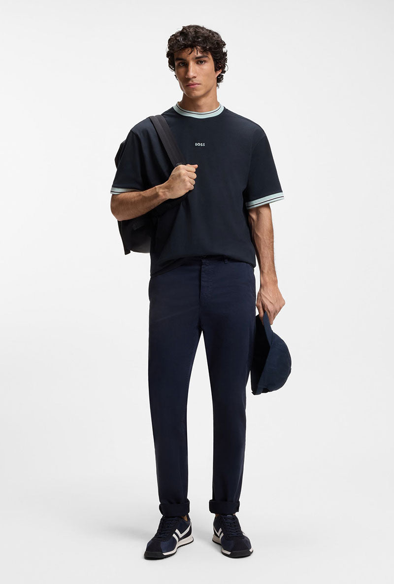 Front image of a model wearing Te blocks tshirt in navy, by brand Boss