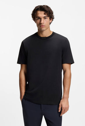 Front image of a model wearing Tee 5 t-shirt in navy, by brand Boss