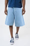 Front image of a model wearing Mason bermuda shorts in denim, by brand Hugo