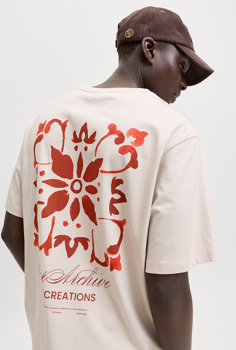 Back image of a model wearing Art print tee in beige, by brand Jack&jones