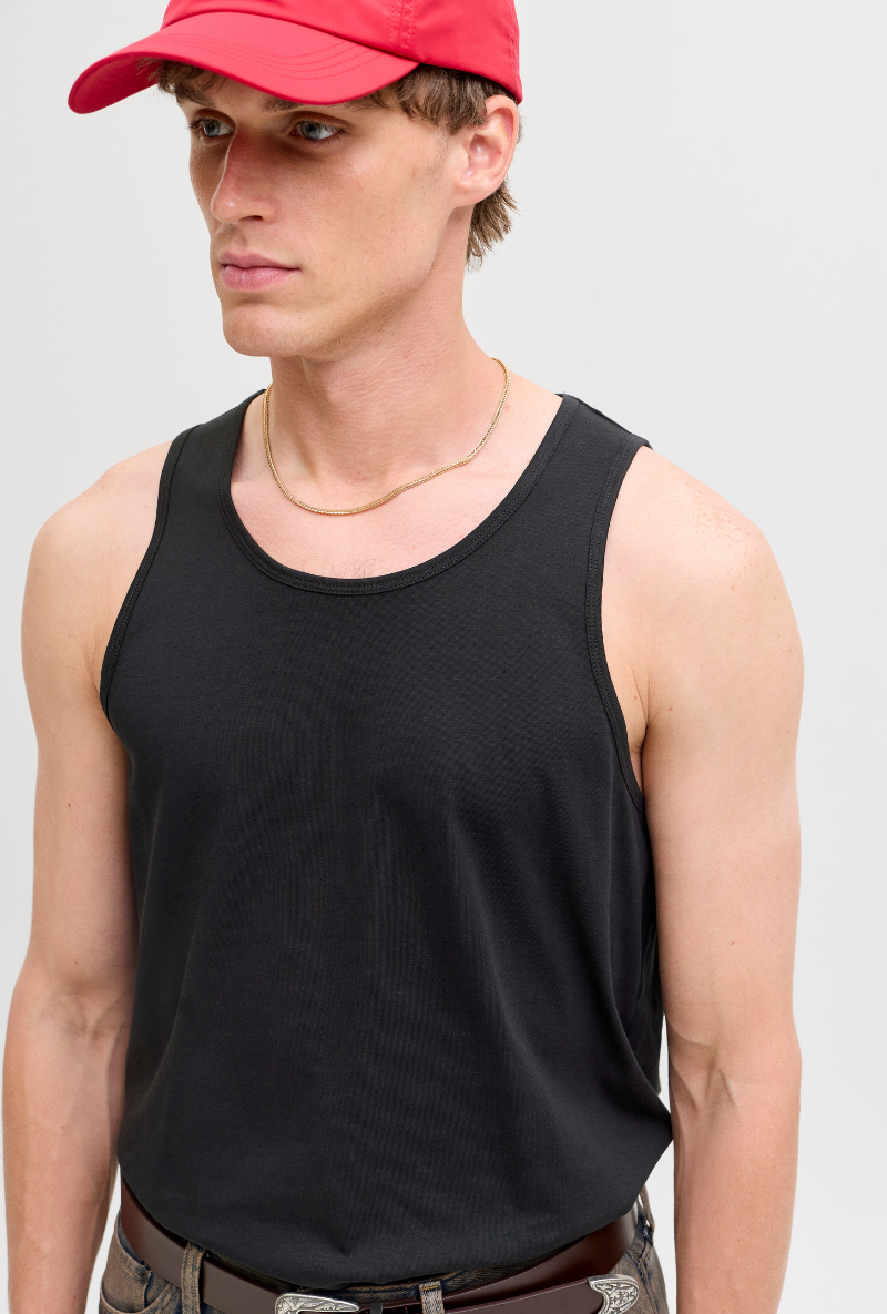 Front image of a model wearing Jack and jones basic tanktop in black, by brand Jack&jones