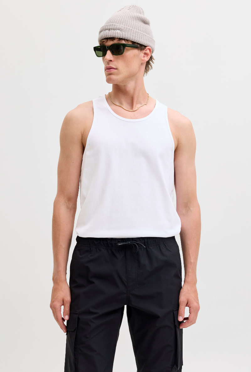 Front image of a model wearing Jack and jones basic tanktop in white, by brand Jack&jones
