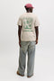 Back image of a model wearing the Brewy ss tee in beige, by brand Jack&jones