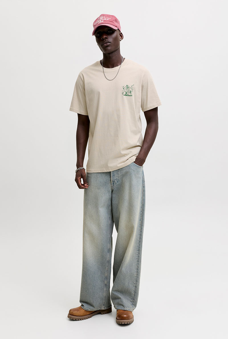 Front image of a model wearing Brewy ss tee in beige, by brand Jack&jones