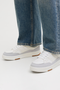 Front image of a model wearing the Jack and jones blanco pu sneaker in beige, by brand Jack&jones
