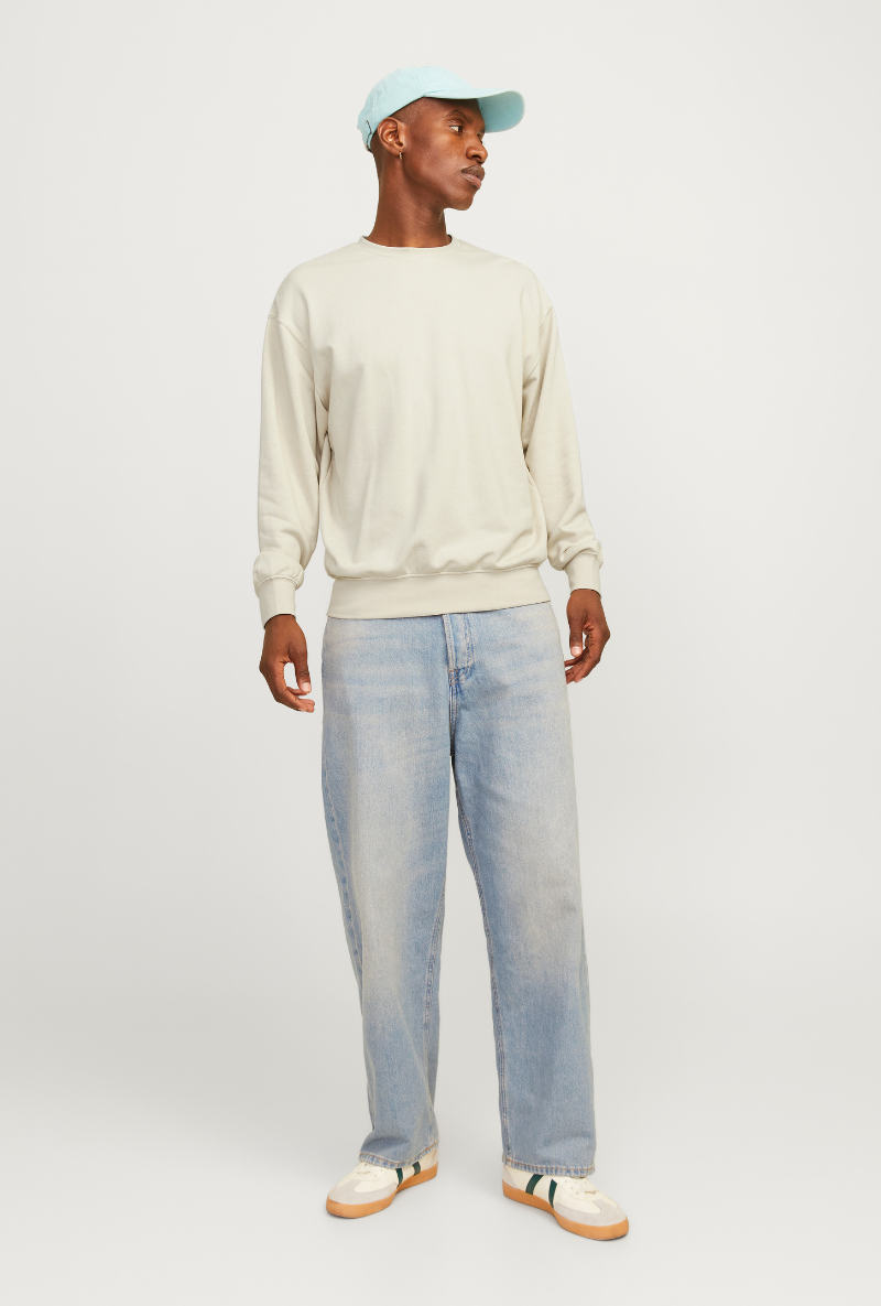 Front image of a model wearing Jack and jones charge sweatshirt in beige, by brand Jack&jones