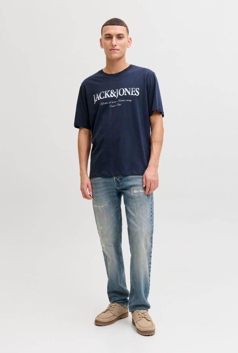Front image of a model wearing Jack and jones daytona print tee in navy, by brand Jack&jones