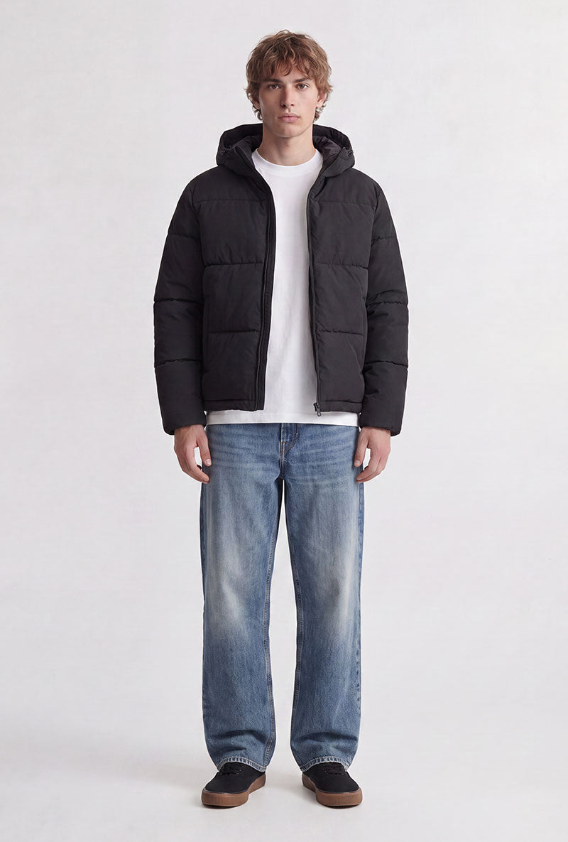 Front image of a model wearing Galaxy puffer jacket in black, by brand Jack&jones