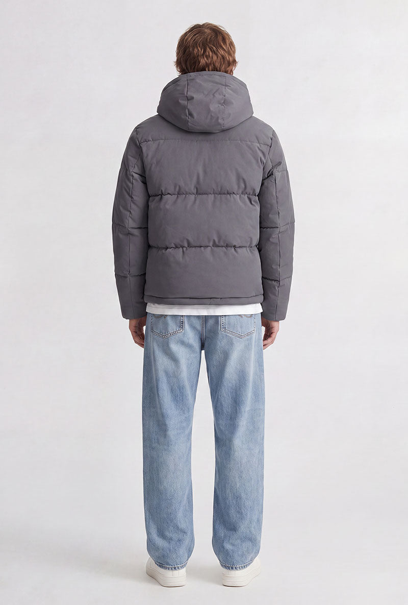 Back image of a model wearing Galaxy puffer jacket in charcoal, by brand Jack&jones