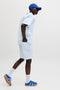 Front image of a model wearing the Jaiden milo seersucker shorts in light blue, by brand Jack&jones