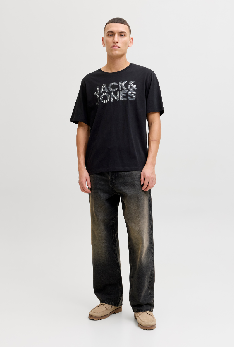 Front image of a model wearing Jack and jones jeff logo tee in black, by brand Jack&jones