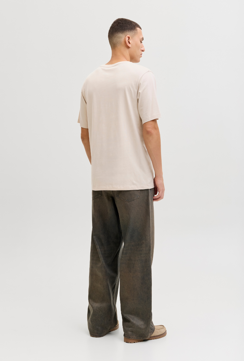 Back image of a model wearing Jack and jones jeff logo tee in stone, by brand Jack&jones