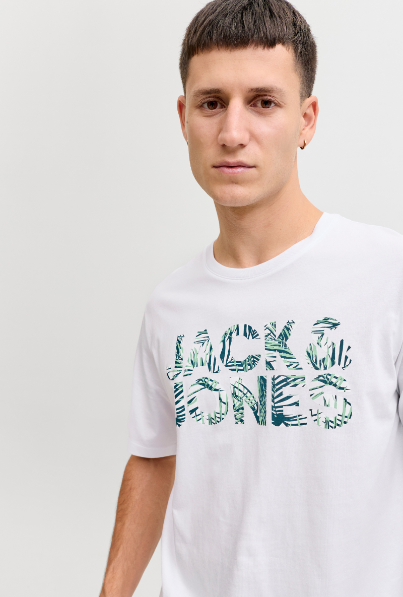 Front image of a model wearing Jack and jones jeff logo tee in white, by brand Jack&jones