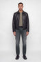 Front image of a model wearing the Mike original jeans in black, by brand Jack&jones