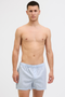 Front image of model wearing the Jack and jones milano woven 3 pk trunks in light blue, by brand Jack&jones
