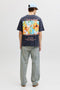 Back image of a model wearing the Montauk back graphic tee in charcoal, by brand Jack&jones