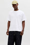 Front image of a model wearing Montauk back graphic tee in white, by brand Jack&jones