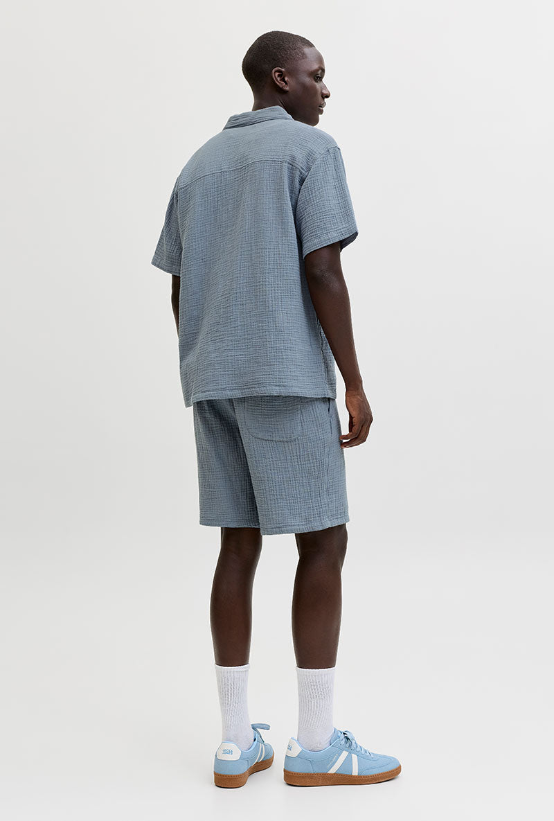 Back image of a model wearing Nantucket double cloth ss shirt in blue, by brand Jack&jones