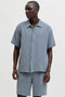 Front image of a model wearing Nantucket double cloth ss shirt in blue, by brand Jack&jones