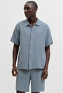 Image of NANTUCKET DOUBLE CLOTH SS SHIRT in blue, by brand JACK&JONES