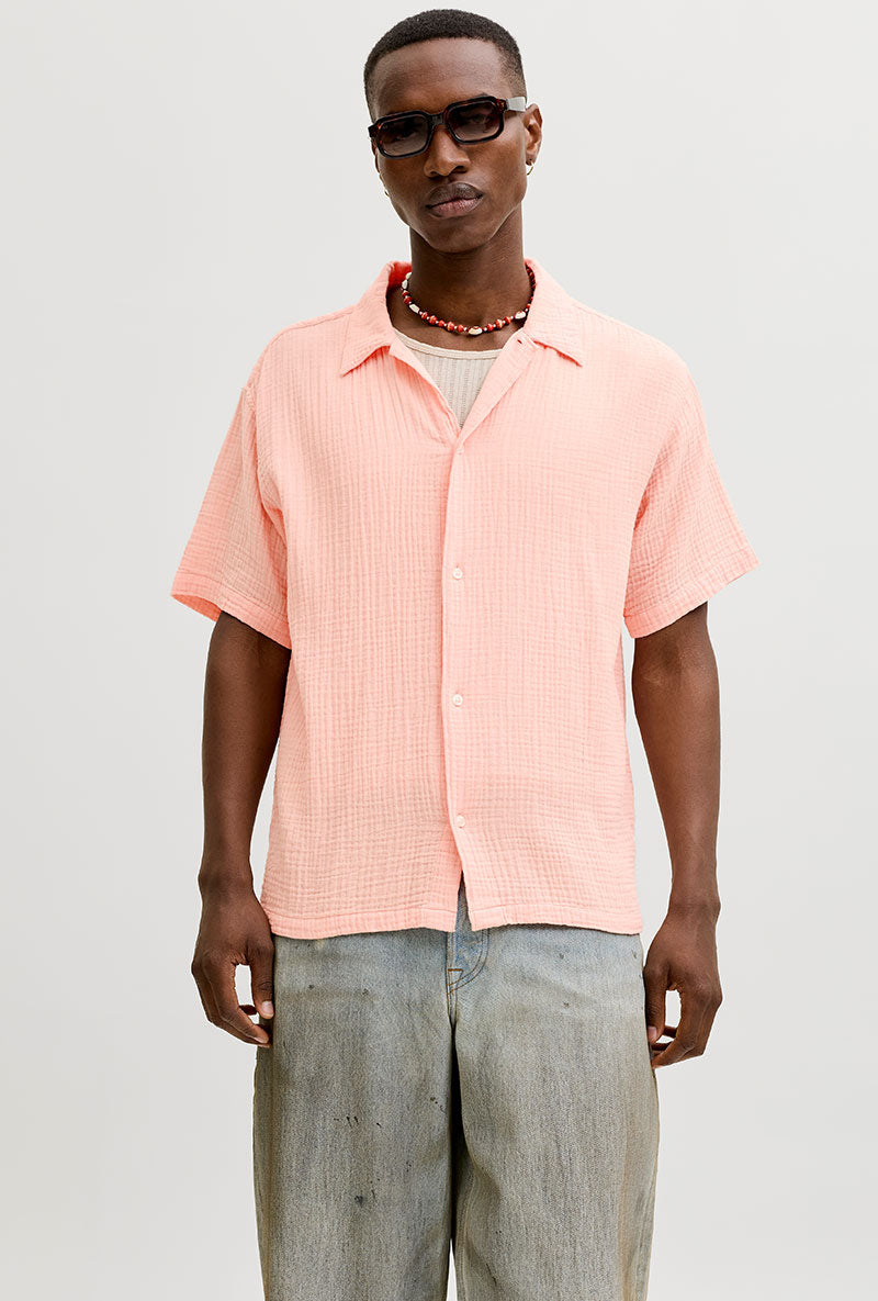 Front image of a model wearing Nantucket double cloth ss shirt in peach, by brand Jack&jones