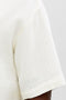 Front detail image of a model wearing the Nantucket double cloth ss shirt in off white, by brand Jack&jones