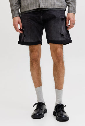 Front image of a model wearing Rick jj fox denim shorts in black, by brand Jack&jones