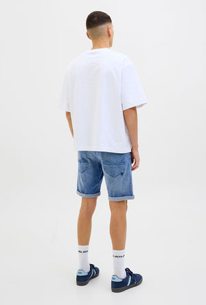 Back image of a model wearing the Rick jj fox denim shorts in light denim, by brand Jack&jones