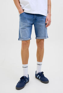 Front image of a model wearing the Rick jj fox denim shorts in light denim, by brand Jack&jones
