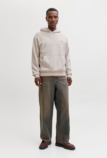 Front image of a model wearing the Jack and jones roar sweat hood in beige, by brand Jack&jones