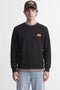 Front image of a model wearing Rush sweat crew neck sweatshirt in black, by brand Jack&jones