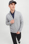 Front image of a model wearing the Soho ollie high neck zip knit in light grey, by brand Jack&jones