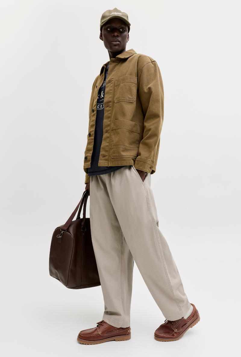 Front image of a model wearing Jack and jones stevan dylan jogger in stone, by brand Jack&jones