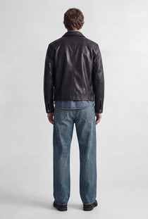 Back image of a model wearing the Ted jj cooper am559 jeans in denim, by brand Jack&jones