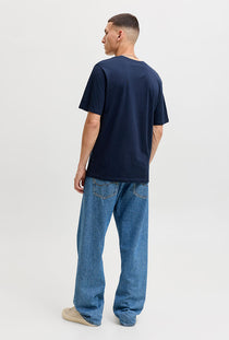 Back image of a model wearing the Tom tee ss crew neck in navy, by brand Jack&jones