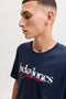 Front image of a model wearing the Tom tee ss crew neck in navy, by brand Jack&jones