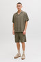 Front image of a model wearing the Tyson resort shirt in khaki, by brand Jack&jones