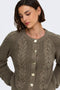 Front image of a model wearing the Carmella ls cable knit cardigan in brown, by brand Jacqueline de yong