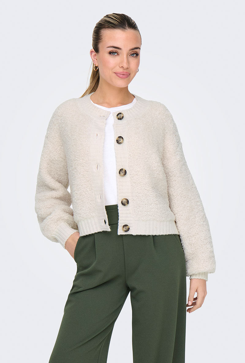 Front image of a model wearing Eira life oneck cardigan in off white, by brand Jacqueline de yong