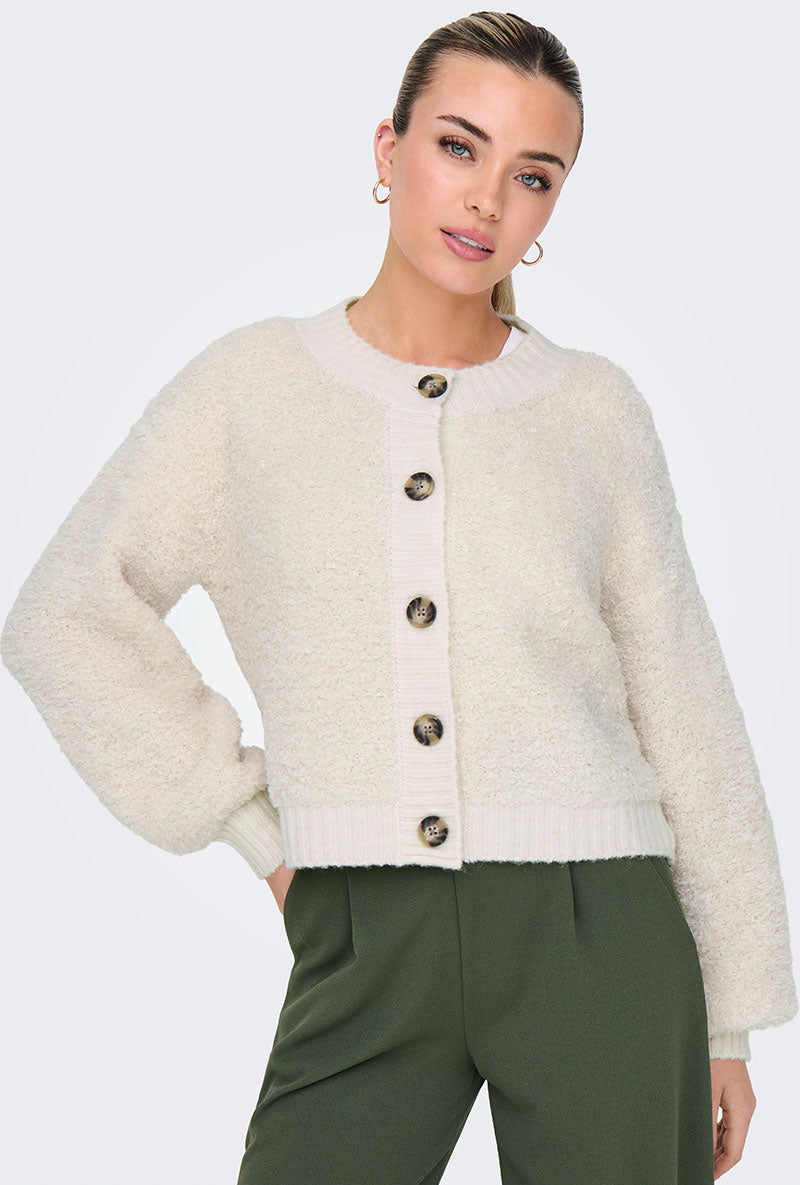 Front image of a model wearing Eira life oneck cardigan in off white, by brand Jacqueline de yong