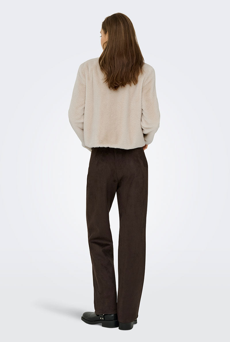 Back image of a model wearing Macy faux fur jacket in beige, by brand Jacqueline de yong
