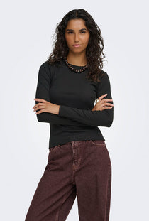 Front image of a model wearing the Lucky l/s oneck top in black, by brand Jacqueline de yong