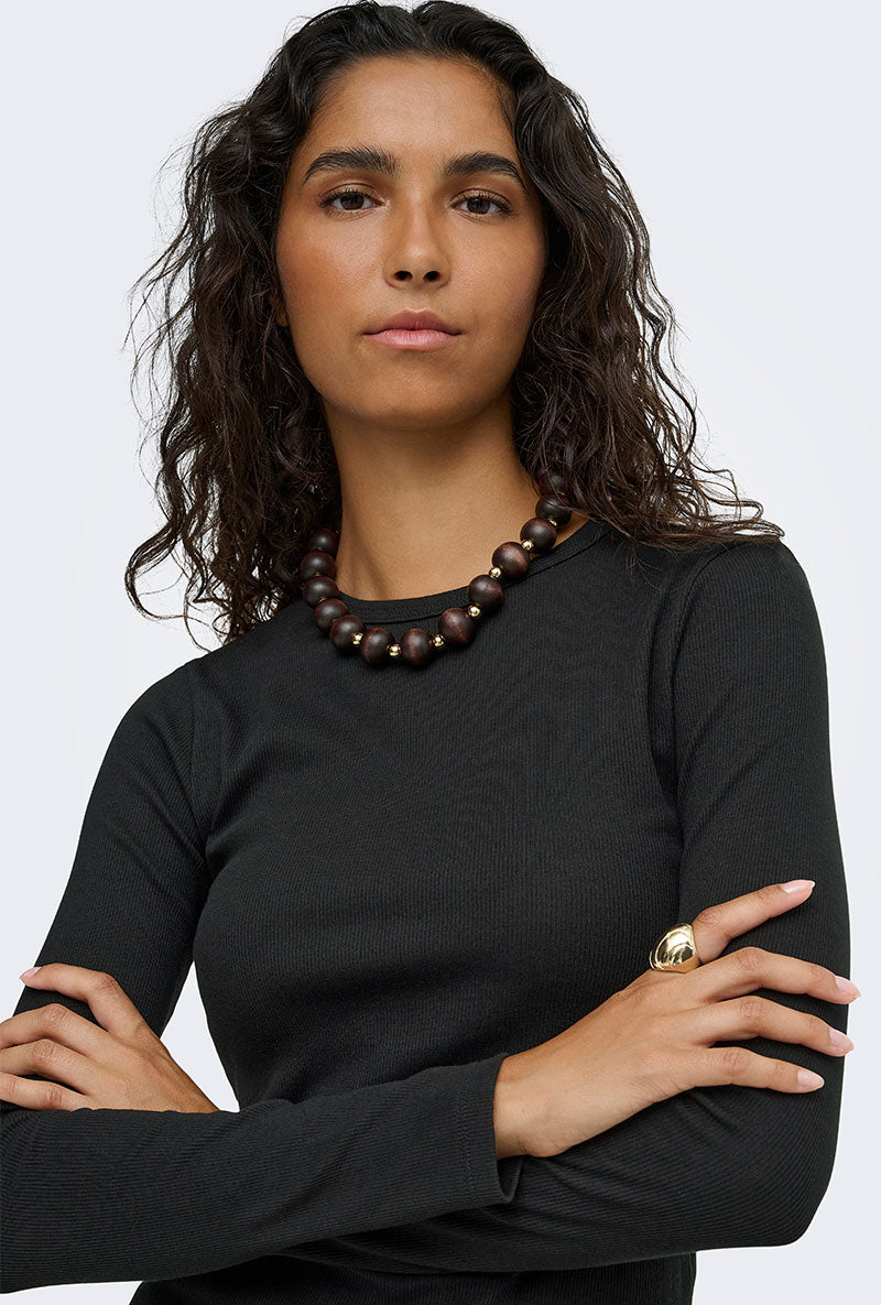 Front image of a model wearing Lucky l/s oneck top in black, by brand Jacqueline de yong