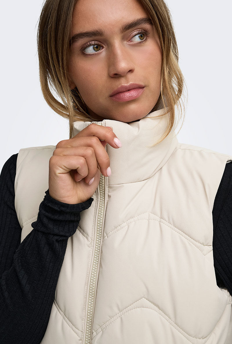 Front image of a model wearing Power short waistcoat in beige, by brand Jacqueline de yong